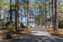 Gorgeous 4 level home surrounded by pine trees with a full for sale in Beaufort South Carolina Beaufort County County on GolfHomes.com