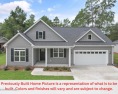 This stunning new home by Langbeen Builders, Inc., a for sale in Southport North Carolina Brunswick County County on GolfHomes.com