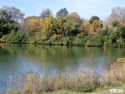LAKE FRONT PROPERTY IN SUNSET LAKES SUBDIVISION. GREAT for sale in Pekin Illinois Tazewell County County on GolfHomes.com