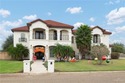 Experience exceptional living in this beautifully remodeled for sale in Weslaco Texas Hidalgo County County on GolfHomes.com