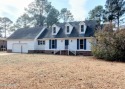 Discover this attractive two-story home boasting loads of curb for sale in New Bern North Carolina Craven County County on GolfHomes.com