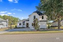 A Must See! Sought after Sweetwater Plan, beautiful L-shaped for sale in Fairhope Alabama Baldwin County County on GolfHomes.com