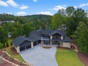 Welcome to an extraordinary lakefront retreat in the prestigious for sale in Six Mile South Carolina Pickens County County on GolfHomes.com