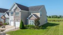 Welcome to this stunning 4-bedroom, 2.5-bathroom end unit for sale in Millsboro Delaware Sussex County County on GolfHomes.com