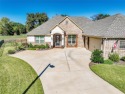 Situated on # 10 in gated Harbor Lakes subdivision & short walk for sale in Granbury Texas Hood County County on GolfHomes.com