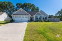 Welcome home to this beautifully maintained 3-bedroom, 2-bath for sale in Sneads Ferry North Carolina Onslow County County on GolfHomes.com