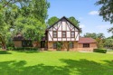 Incredible Tudor-style home on a full acre overlooking the newly for sale in Tallahassee Florida Leon County County on GolfHomes.com