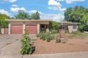 OWNED SOLAR PANELS, MINUTES AWAY FROM UNM, AND UPDATED! Welcome for sale in Albuquerque New Mexico Bernalillo County County on GolfHomes.com