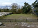 Build your beach house on this lovely lot with marsh views and for sale in Oak Island North Carolina Brunswick County County on GolfHomes.com