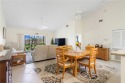 Feel the spaciousness created by the vaulted ceilings, generous for sale in Vero Beach Florida Indian River County County on GolfHomes.com