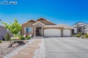 Welcome to your dream home, where breathtaking mountain vistas for sale in Peyton Colorado El Paso County County on GolfHomes.com