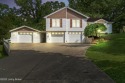 Discover serene, nature-filled living in this updated ranch home for sale in Brandenburg Kentucky Meade County County on GolfHomes.com