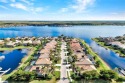 A coveted navigable lake lot in the sensational one-of-a-kind for sale in Naples Florida Collier County County on GolfHomes.com