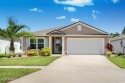 Located in the desirable Grand Reserve golf course community for sale in Bunnell Florida Flagler County County on GolfHomes.com