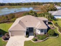 Bond Paid! CUSTOM designer home located in the sought-after for sale in The Villages Florida Sumter County County on GolfHomes.com