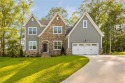 Stunning new construction with serene views of Cypress Creek! for sale in Smithfield Virginia Isle of Wight County County on GolfHomes.com