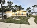 The Lot Rent for this home is $1,342.00/monthly.  Beautiful Palm for sale in North Fort Myers Florida Lee County County on GolfHomes.com