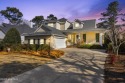 Nestled along the 7th fairway of the renowned Tom Fazio-designed for sale in Wilmington North Carolina New Hanover County County on GolfHomes.com