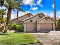 Nestled between the majestic backdrop of golf course greens and for sale in Laughlin Nevada Clark County County on GolfHomes.com