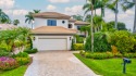 This stunning contemporary estate sits on a premier corner lot for sale in Boca Raton Florida Palm Beach County County on GolfHomes.com