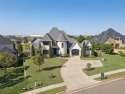 Custom Build by Tim Hughes in Rose Creek!  This beautiful home for sale in Edmond Oklahoma Oklahoma County County on GolfHomes.com