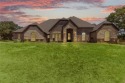 Discover your dream retreat in Brock ISD, nestled on the for sale in Lipan Texas Parker County County on GolfHomes.com