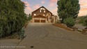 Sip your morning coffee on the covered deck while taking in for sale in New Castle Colorado Garfield County County on GolfHomes.com