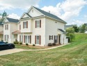 Spacious 2-bedroom, 2.5-bath end-unit townhouse. The inviting for sale in Charlotte North Carolina Mecklenburg County County on GolfHomes.com