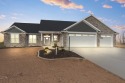 Welcome to this newly constructed, luxurious ranch style home in for sale in Wrightstown Wisconsin Outagamie County County on GolfHomes.com