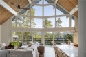 Perched in a prime first tier location, this fully renovated for sale in Lake Arrowhead California San Bernardino County County on GolfHomes.com