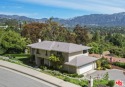 With a sweeping and unmatched view of the majestic mountains in for sale in Pasadena California Los Angeles County County on GolfHomes.com