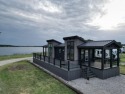 Do you love the lake? How about golf? This new cottage is for sale in Eastland Texas Eastland County County on GolfHomes.com