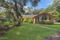 Welcome to this charming ranch-style home on Lady's Island for sale in Beaufort South Carolina Beaufort County County on GolfHomes.com