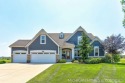 Welcome to 4401 Grand Point, a stunning home nestled on nearly for sale in Holland Michigan Ottawa County County on GolfHomes.com