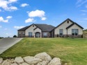 Welcome to this stunning, custom-built luxury home where for sale in Weatherford Texas Parker County County on GolfHomes.com