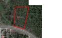 This beautiful mature parcel runs along a paved county road with for sale in Wolverine Lake Michigan Cheboygan County County on GolfHomes.com