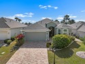 WATER VIEW 2-bed + Den, 2-bath, 2-car garage home in the for sale in Sun City Center Florida Hillsborough County County on GolfHomes.com
