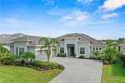 This Aster model home by Lennar in Babcock National is a true for sale in Babcock Ranch Florida Charlotte County County on GolfHomes.com