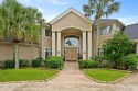 This exquisite contemporary home on the prestigious Windance for sale in Gulfport Mississippi Harrison County County on GolfHomes.com