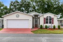 Escape to your ideal retirement sanctuary within a tranquil 55+ for sale in Davenport Florida Polk County County on GolfHomes.com