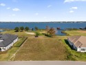 Seize this incredible opportunity to own a 1.44-acre waterfront for sale in Deer Island Florida Lake County County on GolfHomes.com