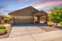 This beautiful single-story home located within the panoramic for sale in Buckeye Arizona Maricopa County County on GolfHomes.com