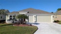 Welcome to this stunning 3-bedroom, 2-bathroom Iris model home for sale in The Villages Florida Marion County County on GolfHomes.com