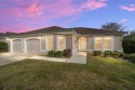 Welcome to this desirable, BLOCK  STUCCO home in the sought for sale in The Villages Florida Marion County County on GolfHomes.com