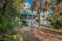 Adorable Summer cottage on the beautiful Ocean Creek golf course for sale in Fripp Island South Carolina Beaufort County County on GolfHomes.com