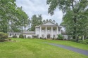 Nestled on a spacious meticulously landscaped site in East Cobbs for sale in Marietta Georgia Cobb County County on GolfHomes.com