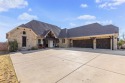 Welcome to this STUNNING 3-bedroom, 2.5-bathroom home nestled for sale in Granbury Texas Hood County County on GolfHomes.com