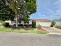 Home is located in Water Oak Country Club Estates in Lady Lake for sale in Lady Lake Florida Lake County County on GolfHomes.com