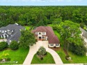 Welcome to your private resort oasis! This stunning custom for sale in St Augustine Florida Saint Johns County County on GolfHomes.com