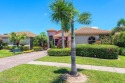 From the moment you walk in, you're greeted with volume ceilings for sale in Boynton Beach Florida Palm Beach County County on GolfHomes.com